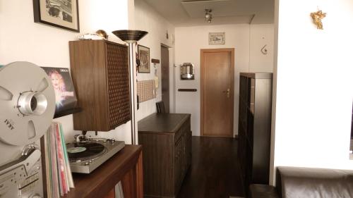 a small room with a kitchen with a sink at Studio with a view of the center of Bratislava in Bratislava