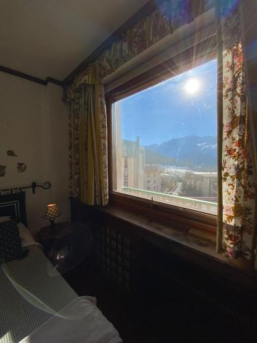 Postel nebo postele na pokoji v ubytování Skyline su Sestriere