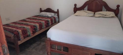 HOSTAL LUPITAにあるベッド