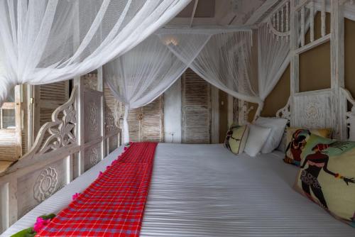 Cama o camas de una habitación en Msambweni Beach House and Private Villas