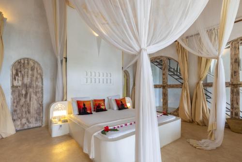 Cama o camas de una habitación en Msambweni Beach House and Private Villas