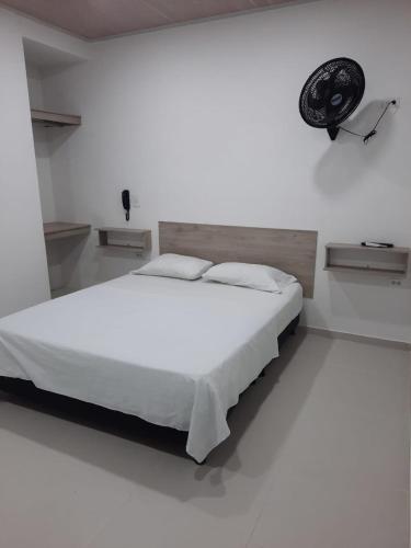 Postel nebo postele na pokoji v ubytování HOTEL MAR DEL CARIBE