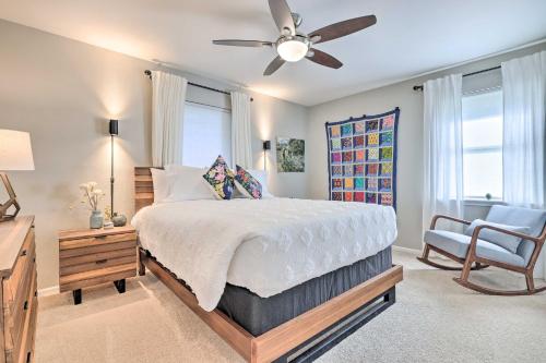a bedroom with a bed and a ceiling fan at Gorgeous San Marco Home with Patio and Gas Grill! in San Marcos