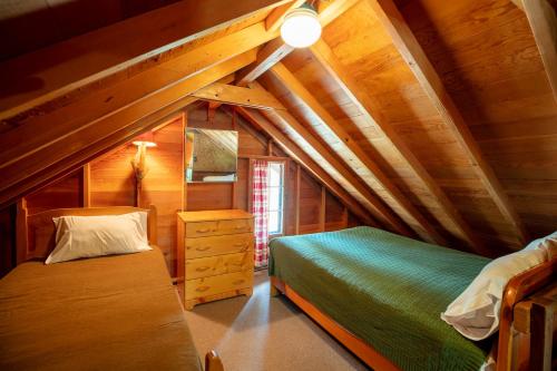 Katil atau katil-katil dalam bilik di The Meeker Park Lodge