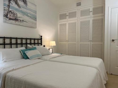 Ένα ή περισσότερα κρεβάτια σε δωμάτιο στο Espectacular casa en la playa