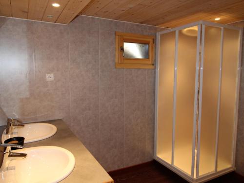 a bathroom with two sinks and a shower at Chalet Aussois, 6 pièces, 14 personnes - FR-1-508-28 in Aussois