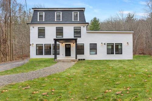 a large white house with a large yard at Pine Hill Chateau - Ski Belleayre, Hunter Mountain in Pine Hill