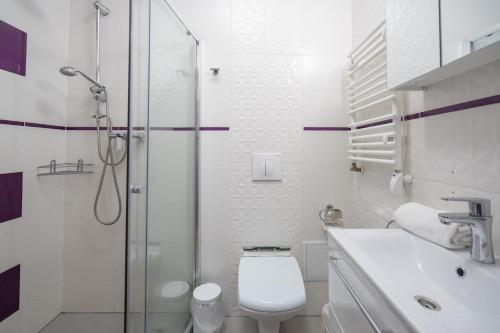 Kúpeľňa v ubytovaní Apartament 38 i 37 Okrzei 1c