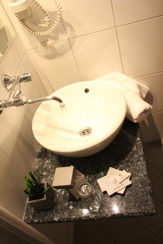 Un baño de Hotel Alhartinger Hof