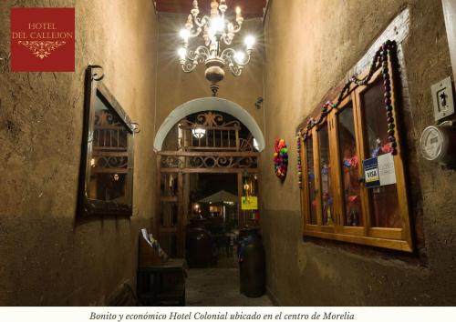 an entrance to a building with a chandelier at Hotel Morelia Callejón in Morelia
