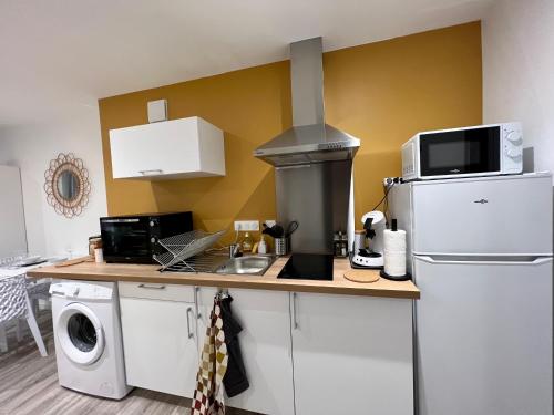 Una cocina o cocineta en La Palmeraie