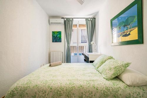 Ένα ή περισσότερα κρεβάτια σε δωμάτιο στο La Latina Sol. Espacioso apartamento, 12 pax