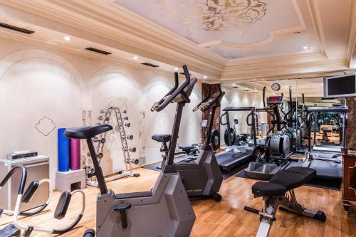 a gym with treadmills ellipticals and exercise bikes at Bentley London in London