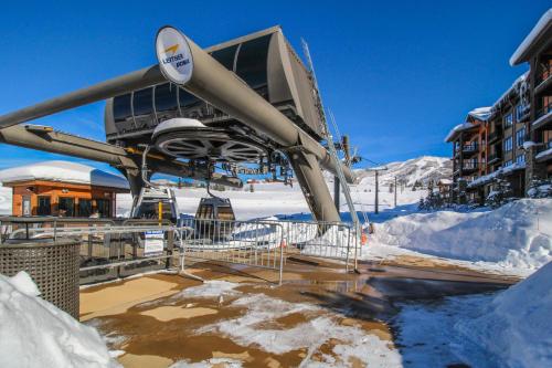a ski lift at a resort in the snow at First Tracks 4202 in Steamboat Springs