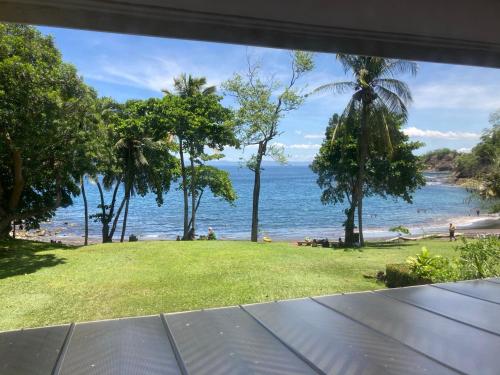 a view of the beach from a house balcony at Bahia Pez Vela Resort in Ocotal