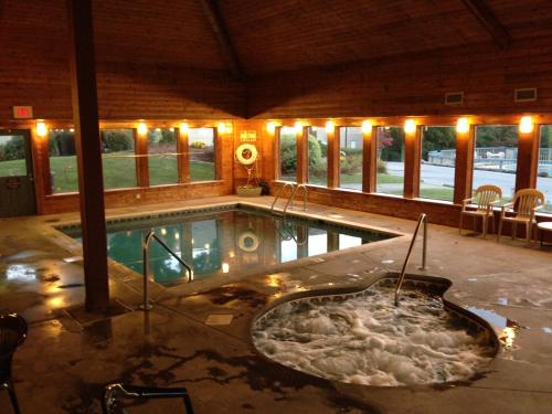 a jacuzzi tub in the middle of a building at Our Place in the Smokies in Gatlinburg