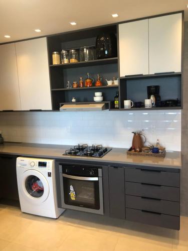 Een keuken of kitchenette bij Apartamento Cruz das Almas