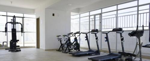 a gym with a bunch of exercise bikes in a room at Exclusive House Cartagena in Cartagena de Indias
