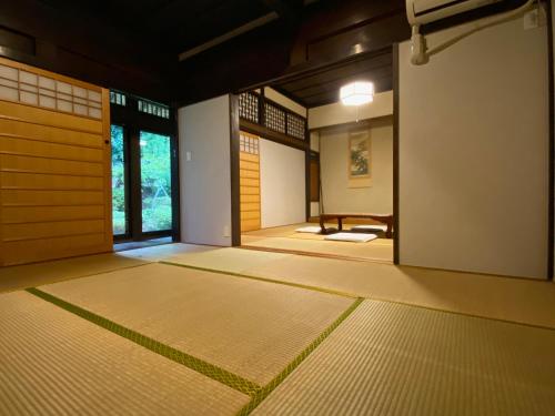 Postel nebo postele na pokoji v ubytování 農家民宿 山いちご