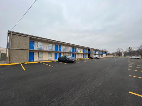 an empty parking lot in front of a building at Super 8 by Wyndham Paducah I-24 Exit 4 in Paducah