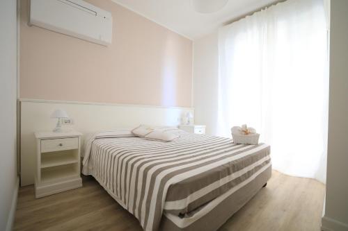 Katil atau katil-katil dalam bilik di Hotel Continental