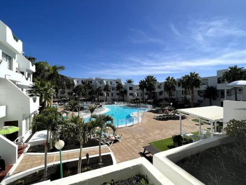 Bazén v ubytovaní Casa Feliz - one bedroom central apartment with communal pool alebo v jeho blízkosti