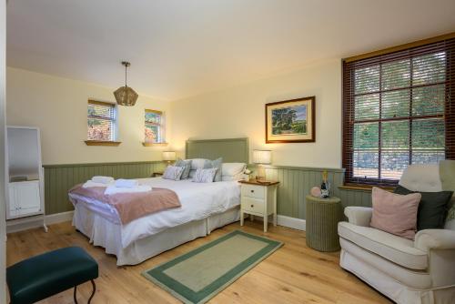 Postel nebo postele na pokoji v ubytování Meldrums Apartments