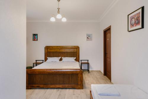 Postel nebo postele na pokoji v ubytování Marcos Hotel