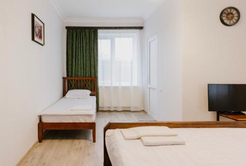 Postel nebo postele na pokoji v ubytování Marcos Hotel