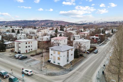 an aerial view of a city with buildings at Acco Guesthouse in Akureyri