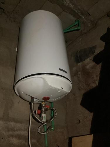 a white light on the ceiling of a building at Gallaghers city ( YameHome ) in Bangangté