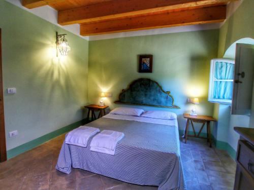 A bed or beds in a room at Holiday Home in Assisi near Monte Subasio