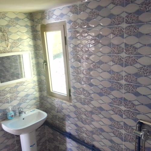 Un baño de ESPACE INOV IMILCHIL