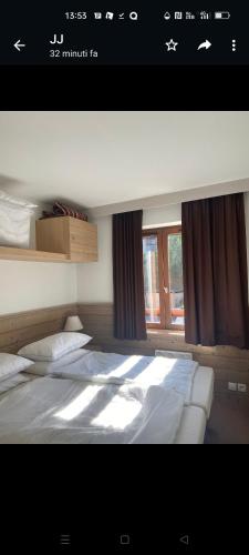 Giường trong phòng chung tại Appartement charmant à La Tania, Courchevel