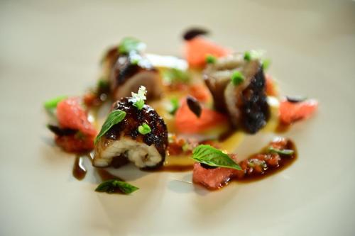 a piece of food on a white plate at Hotel Royal Paestum in Paestum
