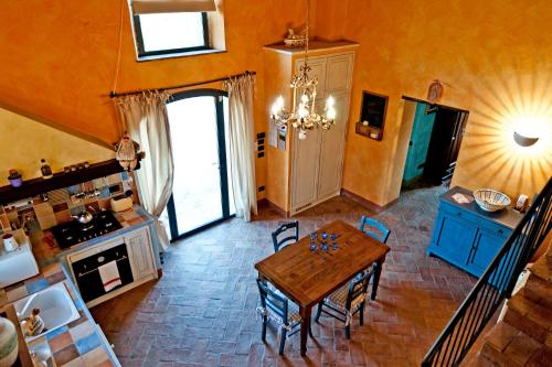 Kuchyň nebo kuchyňský kout v ubytování Casina Botinaccio by Mmega