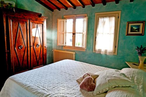 Postel nebo postele na pokoji v ubytování Casina Botinaccio by Mmega