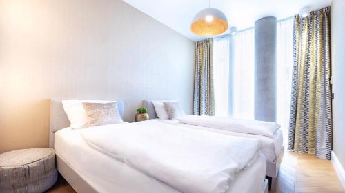 Postel nebo postele na pokoji v ubytování Ultra Marine by Zdrojowa