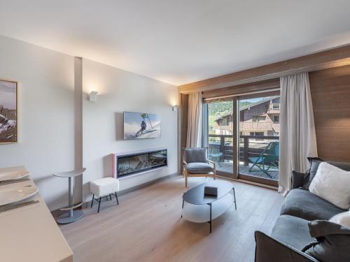 Appartement avec Espace Bien-Être à Megève, Piscine, Salle de Sport et Parking Électrique - FR-1-569-34