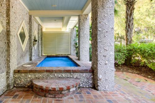a swimming pool in the backyard of a house at Camellia Villa in Saint Simons Island