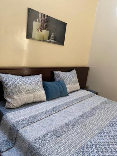 Ένα ή περισσότερα κρεβάτια σε δωμάτιο στο Maison Oceane a Zac MBAO