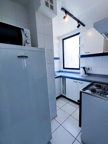 Kuchyň nebo kuchyňský kout v ubytování Tempo Rent Apart Hotel