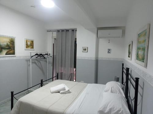 Postel nebo postele na pokoji v ubytování Hotel Alloggio Del Conte