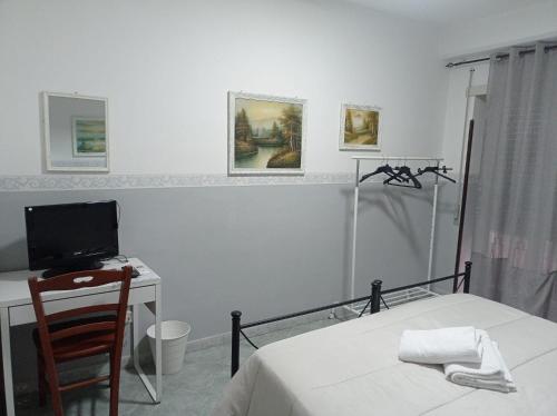 TV a/nebo společenská místnost v ubytování Hotel Alloggio Del Conte