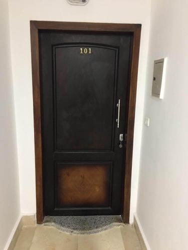 a black door with the number on it at 101 b in Hurghada