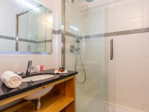 a bathroom with a sink and a shower at Appartement Val-d'Isère, 4 pièces, 8 personnes - FR-1-694-208 in Val-d'Isère