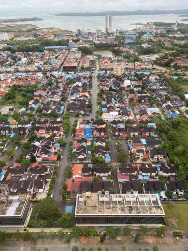 an aerial view of a city with houses at Galeno Pollux Habibie in Batam Center