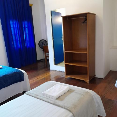 Postel nebo postele na pokoji v ubytování Hotel Barroco Mineiro
