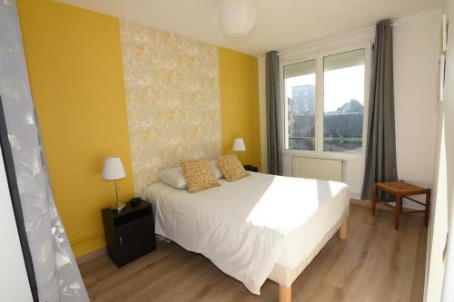 Posteľ alebo postele v izbe v ubytovaní La Jetée Appartement Vue Mer