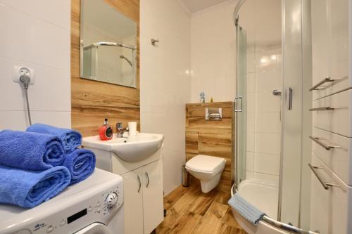 Kúpeľňa v ubytovaní Apartament Gościnny